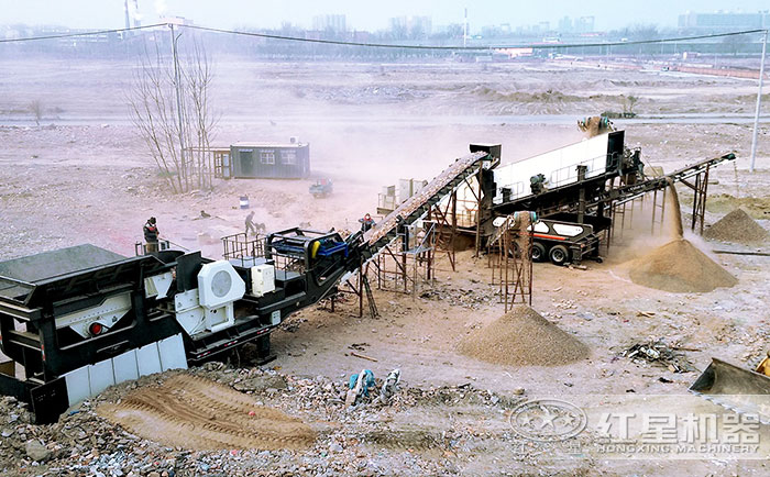 移動(dòng)顎式破碎機(jī)+移動(dòng)反擊破加工建筑垃圾現(xiàn)場